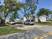 19-From Alabama St, lg shed on left, lg boat, motorhome in the back on Bay St lot